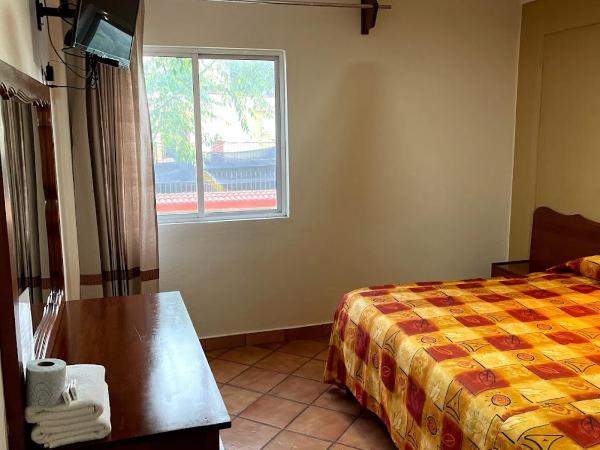 HOTEL BUGAMBILIAS : photo 4 de la chambre grande chambre simple