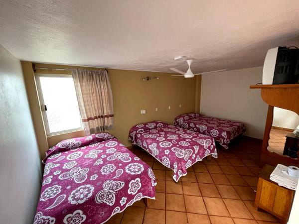 HOTEL BUGAMBILIAS : photo 2 de la chambre chambre triple confort