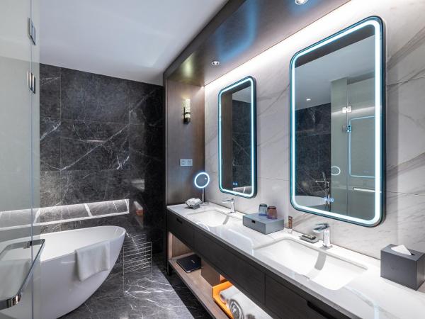 Novotel Xian Xixian : photo 4 de la chambre chambre lit king-size privilège avec canapé