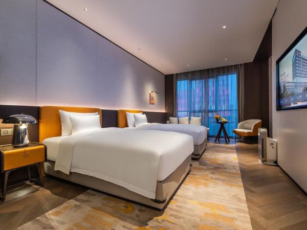 Novotel Xian Xixian : photo 1 de la chambre chambre lits jumeaux supérieure