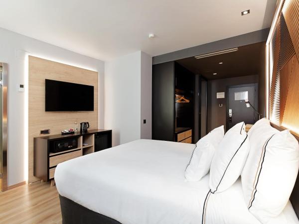 Melia Avenida de America : photo 1 de la chambre chambre lit queen-size melia