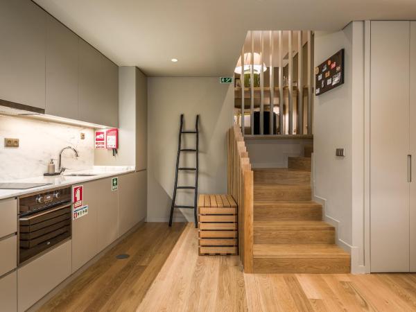 Legends House by Sweet Porto : photo 9 de la chambre chambre double ou lits jumeaux supérieure avec vue sur ville