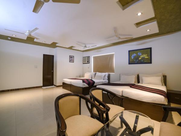 Hotel Karan Vilas : photo 2 de la chambre chambre quadruple - vue sur jardin