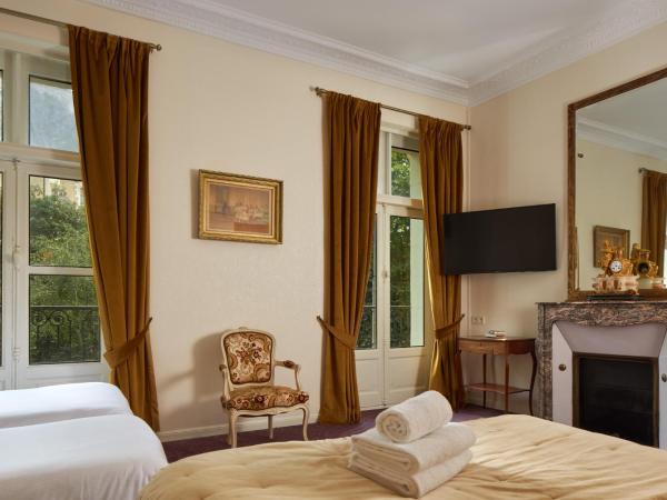 Hôtel De France Et De Guise - 1891 : photo 5 de la chambre chambre quadruple