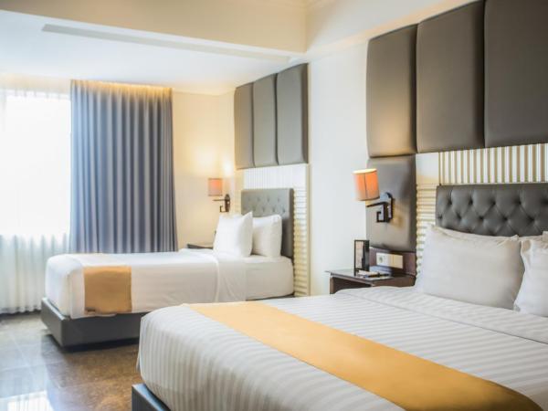 Grand Rohan Jogja : photo 2 de la chambre chambre familiale