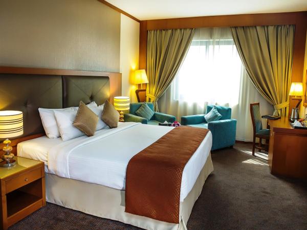 Landmark Summit Hotel : photo 3 de la chambre hébergement double deluxe - lit king-size