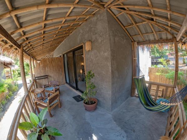 The Lazy Lodge : photo 10 de la chambre bungalow - vue sur jardin