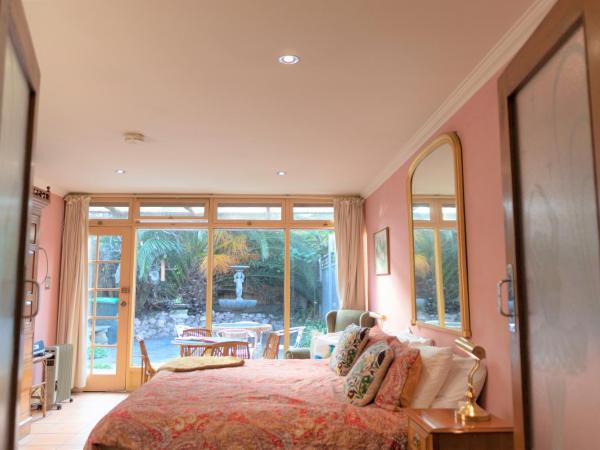 North Adelaide Heritage Cottages & Apartments : photo 2 de la chambre suite king spa