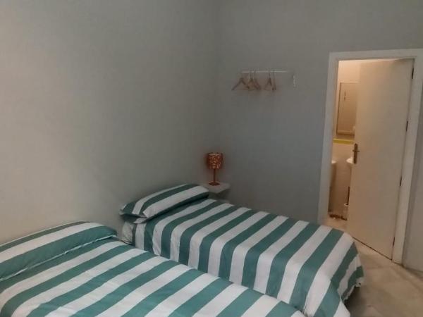 New Samay Hostel : photo 3 de la chambre chambre lits jumeaux avec salle de bains