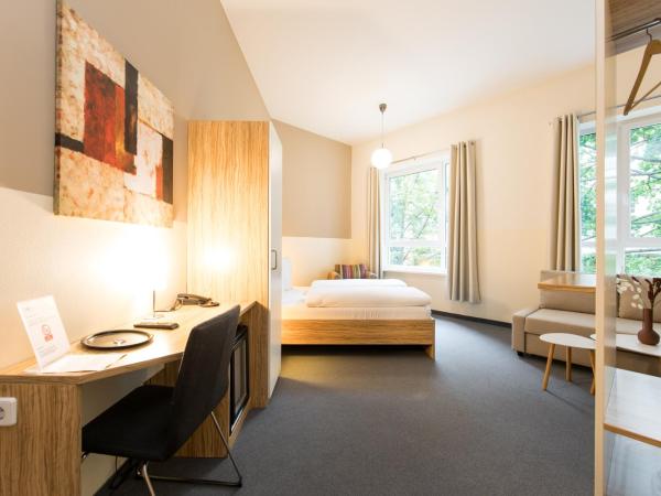 Nu Wave Hotel Berlin - Digital Access 2025 : photo 1 de la chambre chambre quadruple confort