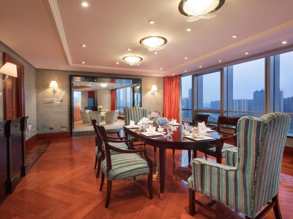 Crowne Plaza Wuxi City Center : photo 3 de la chambre suite présidentielle lit king-size