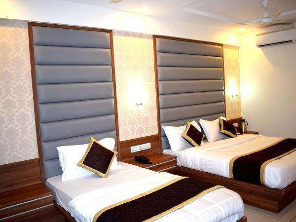 The Royal Square - Sky Stays (Chandkheda) : photo 5 de la chambre chambre triple