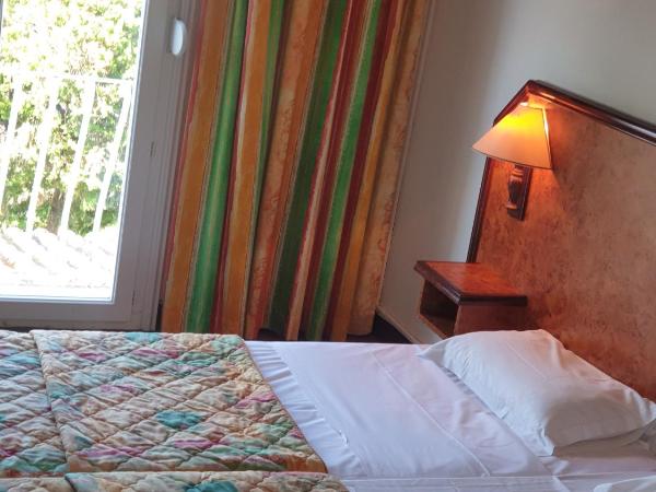 Hotel Madame Mere : photo 1 de la chambre chambre double - côté piscine