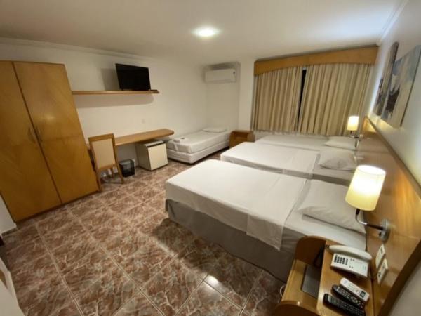 Ideal Praia Hotel : photo 7 de la chambre chambre quadruple