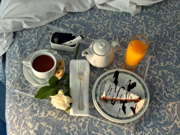 Hotel La Floridiana : photo 7 de la chambre chambre double ou lits jumeaux - vue sur jardin