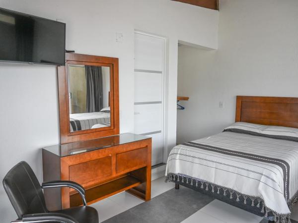 Casa LEONOR : photo 2 de la chambre chambre lits jumeaux - vue sur ville