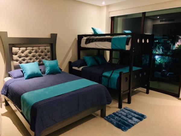 DEPARTAMENTO DE LUJO EN ACAPULCO DIAMANTE : photo 3 de la chambre chambre lits jumeaux