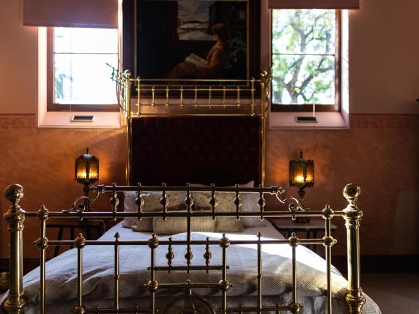 North Adelaide Heritage Cottages & Apartments : photo 4 de la chambre appartement 1 chambre avec baignoire spa