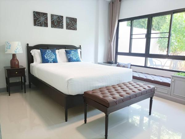 Double Tree Residence : photo 3 de la chambre chambre lit queen-size - vue sur jardin