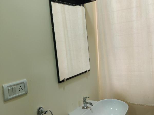 SRI VIGNESH RESIDENCY : photo 7 de la chambre chambre double deluxe (2 adultes + 1 enfant)