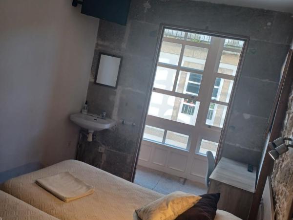 Hostal Forest : photo 4 de la chambre chambre lits jumeaux Économique