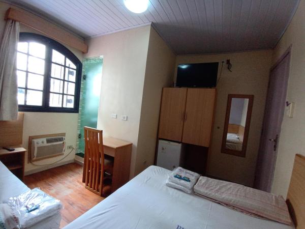 Hotel Pousada Viana : photo 4 de la chambre chambre triple avec salle de bains privative