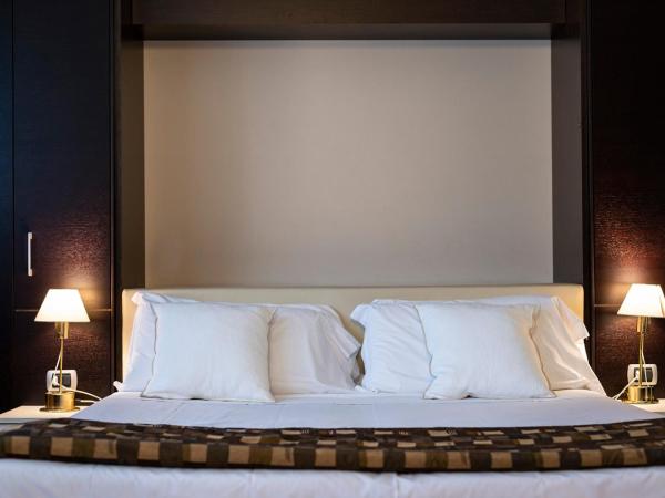 Hotel San Marco Fitness Pool & Spa : photo 1 de la chambre chambre quadruple supérieure