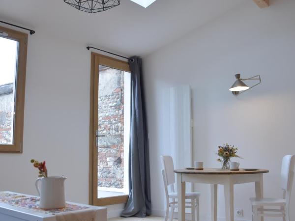 Le Bivouac - Toulouse : photo 3 de la chambre studio avec vue sur jardin