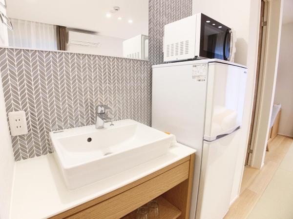 HOTEL CLA-SS HIROSHIMA-TOKAICHI : photo 6 de la chambre chambre quadruple supérieure