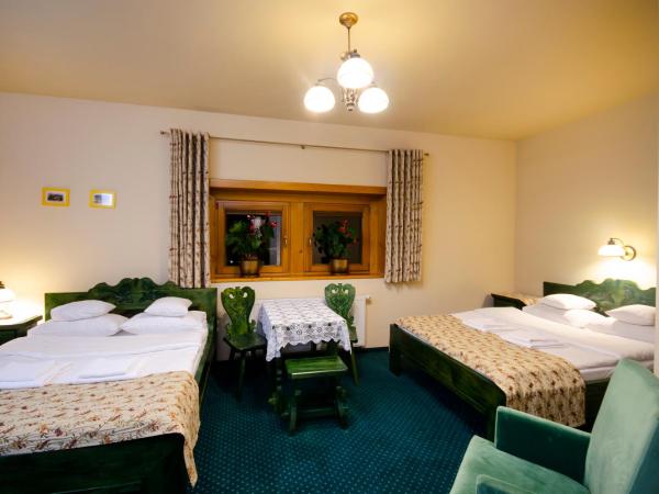 Zakopiański Dwór : photo 3 de la chambre chambre quadruple avec 2 lits doubles