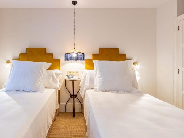 Real Casa de la Moneda Deluxe Apartments : photo 10 de la chambre appartement supérieur