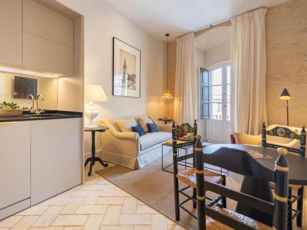 Real Casa de la Moneda Deluxe Apartments : photo 3 de la chambre appartement avec terrasse