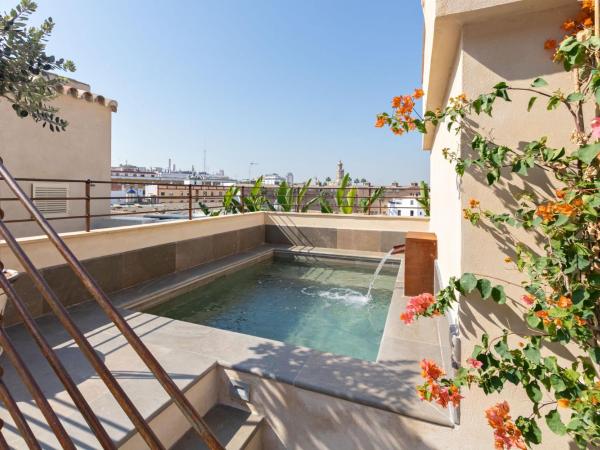 Real Casa de la Moneda Deluxe Apartments : photo 1 de la chambre appartement deluxe