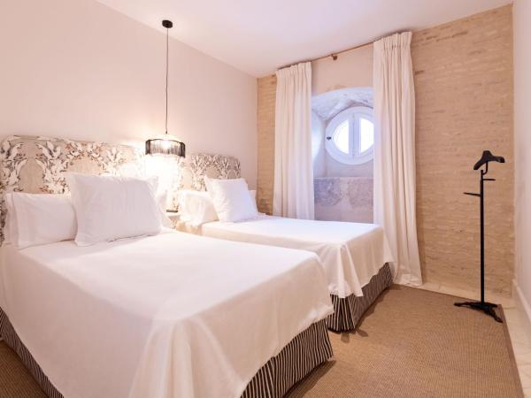 Real Casa de la Moneda Deluxe Apartments : photo 10 de la chambre penthouse