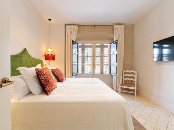 Real Casa de la Moneda Deluxe Apartments : photo 5 de la chambre appartement en duplex