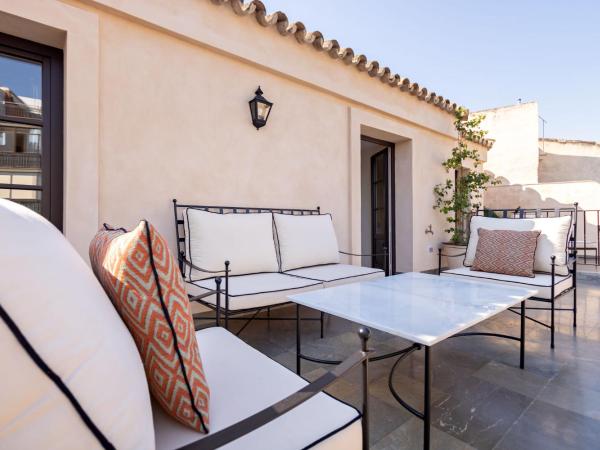 Real Casa de la Moneda Deluxe Apartments : photo 9 de la chambre penthouse