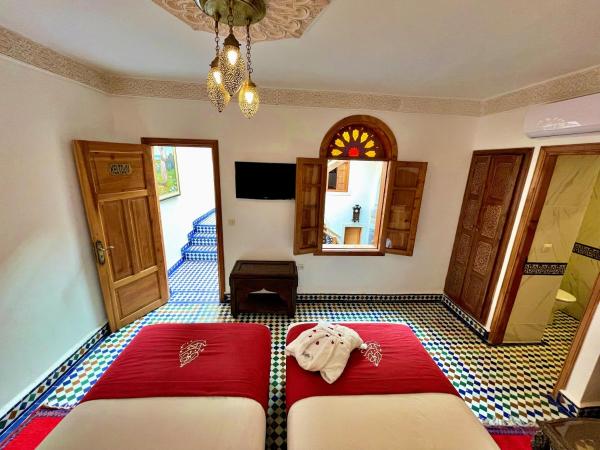 Riad Marjana suites & Spa : photo 3 de la chambre chambre lits jumeaux