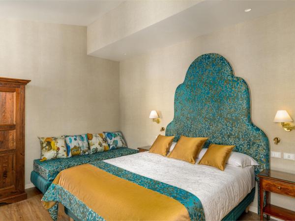 Hotel Villa Rosa : photo 7 de la chambre chambre triple