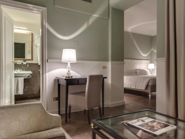 Plaza Hotel Lucchesi : photo 2 de la chambre chambre triple premium