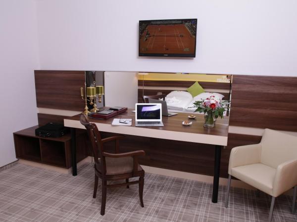 Primus Hotel & Apartments : photo 2 de la chambre chambre lits jumeaux