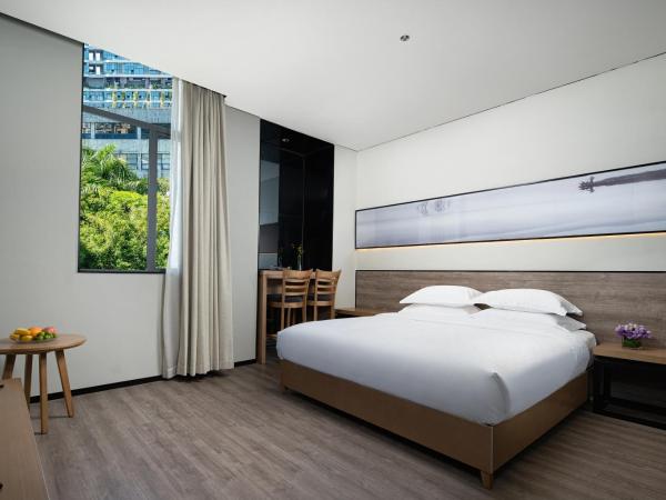 Unijoy Cityinn OCT Loft Shenzhen有集城市客栈创意园店 : photo 2 de la chambre suite deluxe