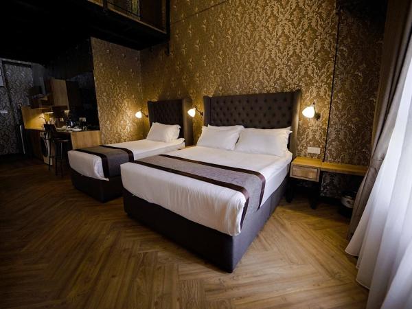 1969 Business Suites : photo 2 de la chambre duplex cozy