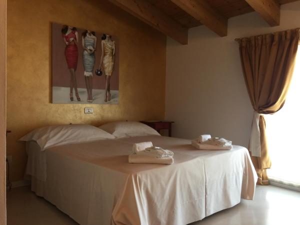 Il Girasole High Quality Inn : photo 1 de la chambre chambre double ou lits jumeaux supérieure