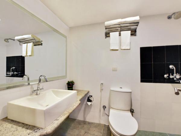 Manpho Bell Hotel & Convention Center : photo 4 de la chambre chambre deluxe double ou lits jumeaux