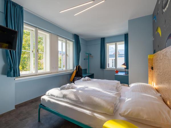 MEININGER Hotel Innsbruck Zentrum : photo 1 de la chambre chambre lits jumeaux