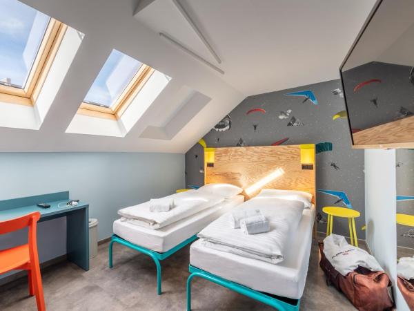 MEININGER Hotel Innsbruck Zentrum : photo 3 de la chambre chambre lits jumeaux