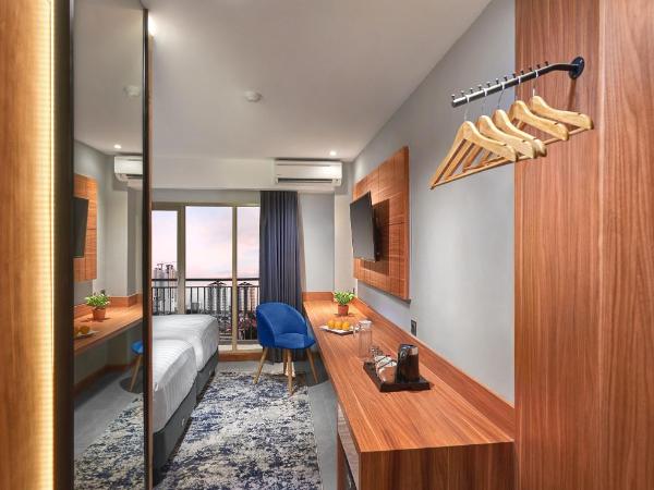 Aston Inn Jemursari : photo 4 de la chambre chambre supérieure