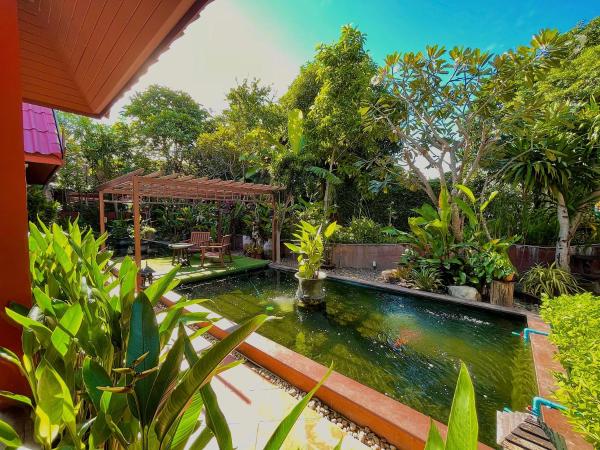 Ruenkanok Thaihouse Resort : photo 9 de la chambre villa avec vue sur Étang 