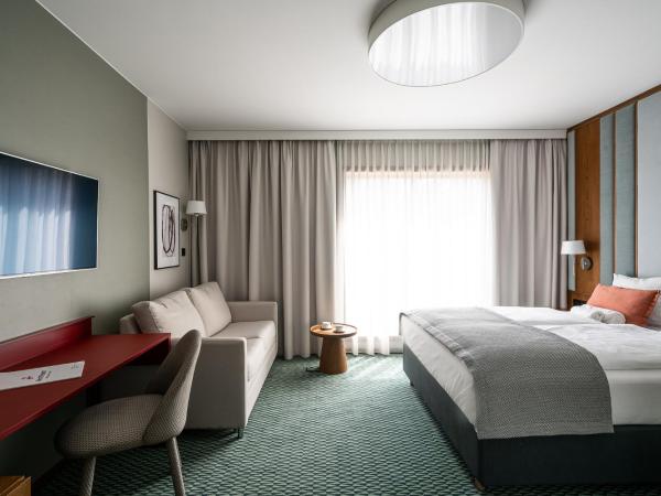 RentPlanet - Apartamenty Centrum : photo 1 de la chambre chambre familiale supérieure