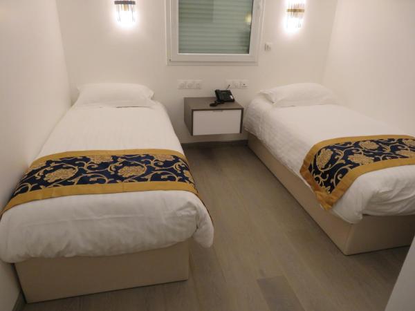 KYRIAD ROUEN SUD - Sotteville les Rouen : photo 3 de la chambre hébergement standard - 2 lits simples